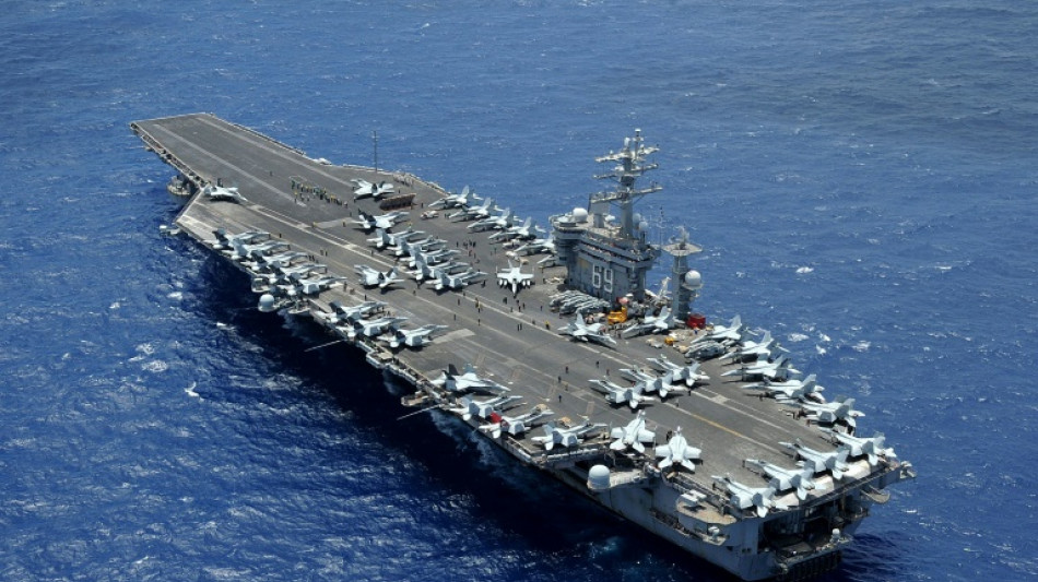 Second US aircraft carrier to back Israel as Biden stresses civilian protection