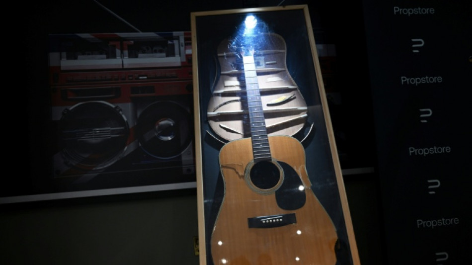 Oasis guitars among music memorabilia worth &pound;3 mn at UK auction