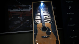 Oasis guitars among music memorabilia worth &pound;3 mn at UK auction