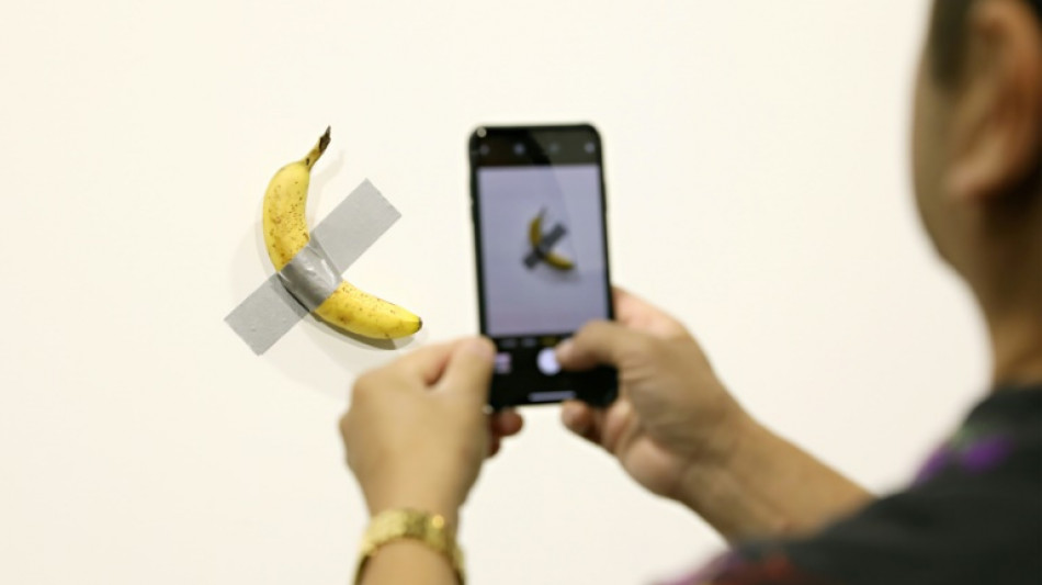 France museum-goer eats million-dollar banana taped to wall