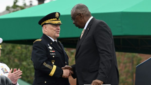 Top US military officer steps down with 'dictator' swipe at Trump