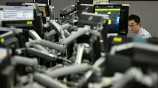 Asia markets mixed as stong US jobs data temper rate expectations