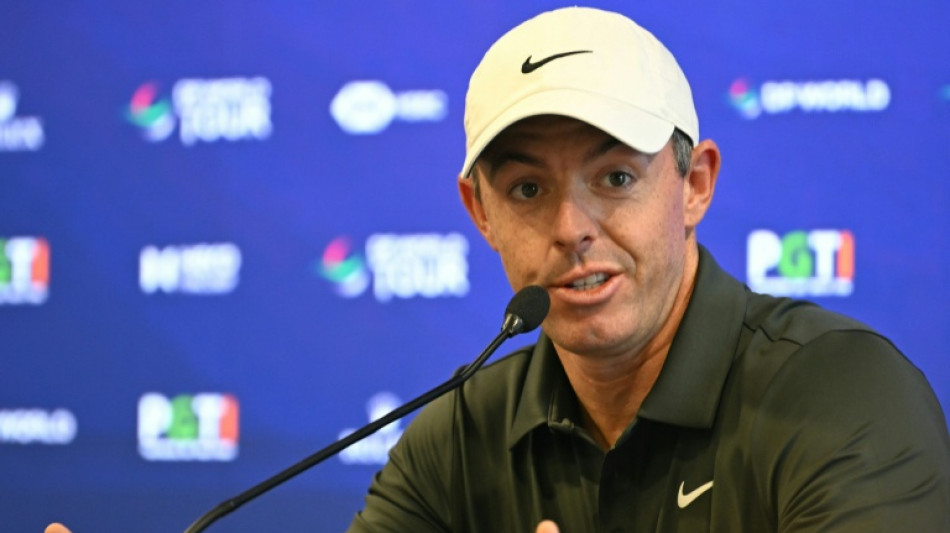 McIlroy dumps driver on India debut, Lowry leads after dog interruption