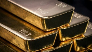 US stocks push higher while gold, silver notch fresh records