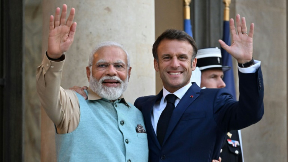 Modi honoured for France's Bastille Day in shadow of riots