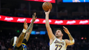 Doncic shines as Lakers cruise past depleted Warriors