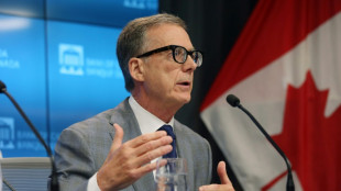 Canada holds key rate steady, says will act if war inflation persists