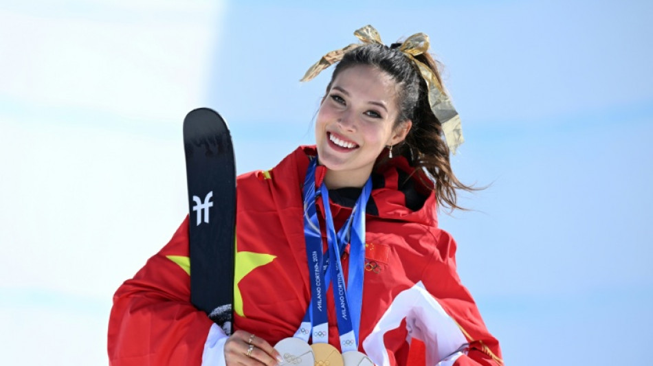 Eileen Gu switches slopes for catwalk after Olympic flourish
