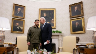 Zelensky wins Biden support vow but faces US skeptics