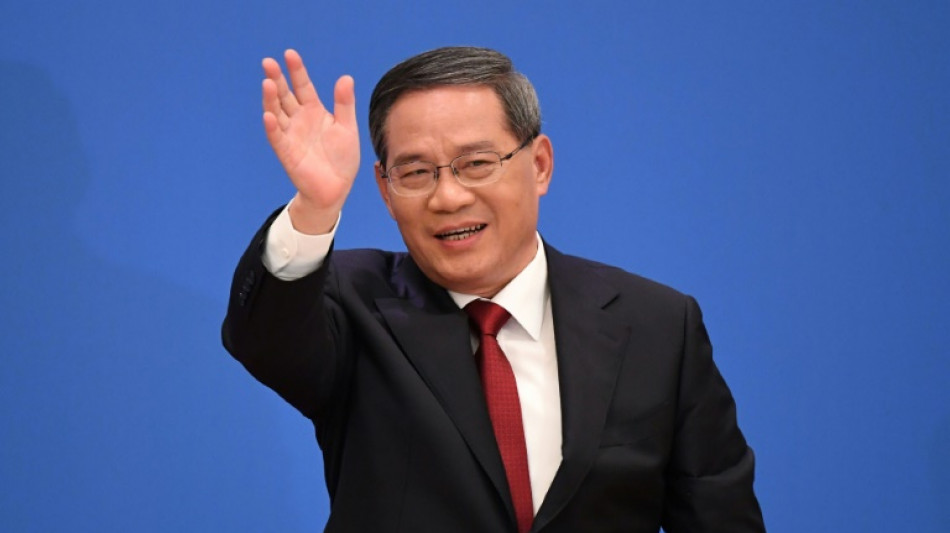 Chinese premier in Germany as Western mistrust mounts