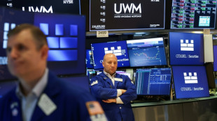 Wall Street hésite, entre tensions commerciales et baisses des taux