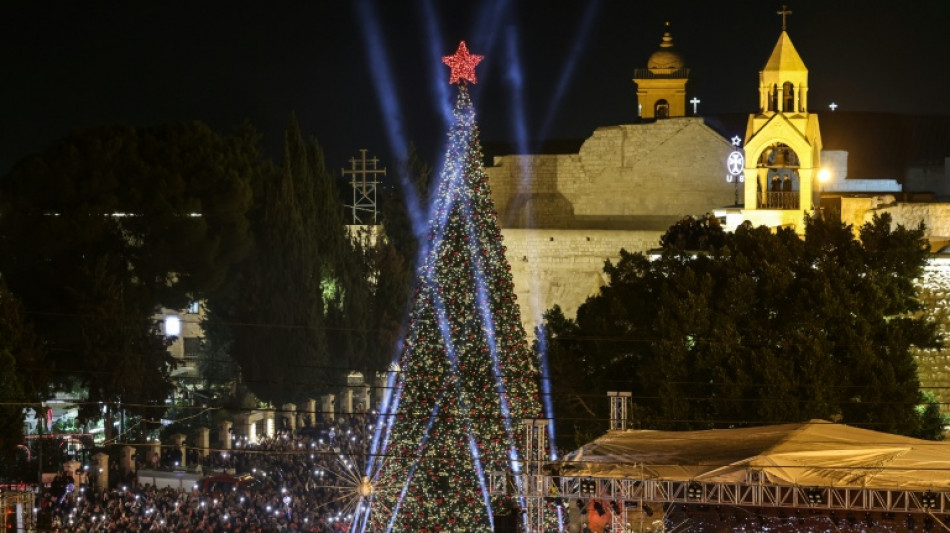 Bethlehem Christmas tree lit up for first time since Gaza war