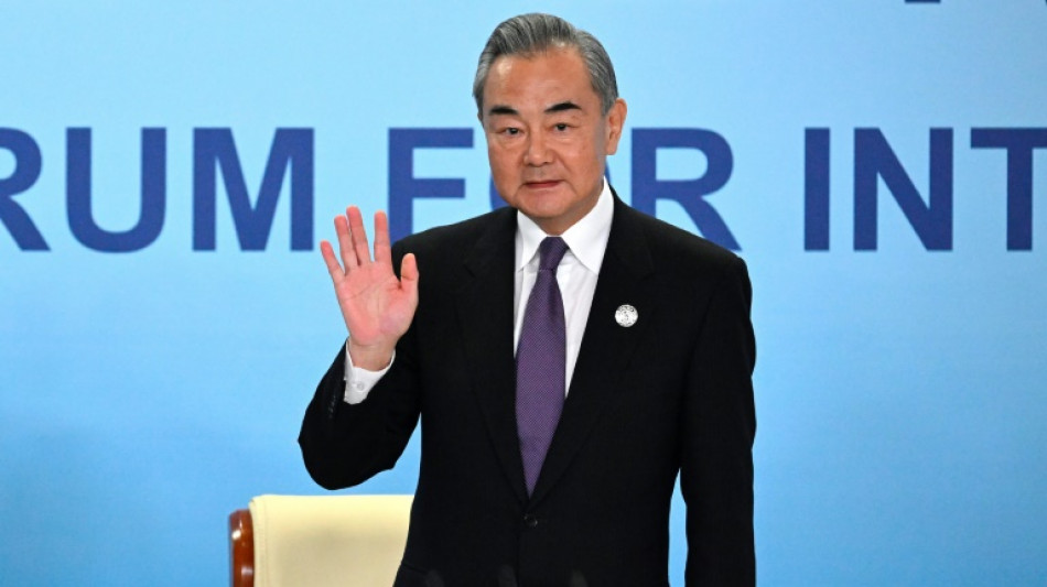 China's top diplomat starts US visit as Biden stands firm