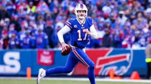 Bills survive scare to beat Dolphins, Giants upset Vikings