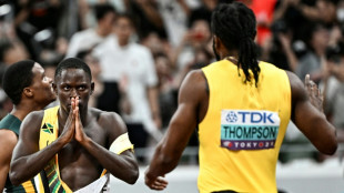 Seville delighted to win world 100m title in front of Bolt