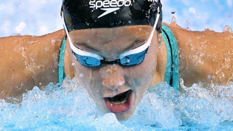 McIntosh powers to third gold of worlds, 12-year-old Yu fourth