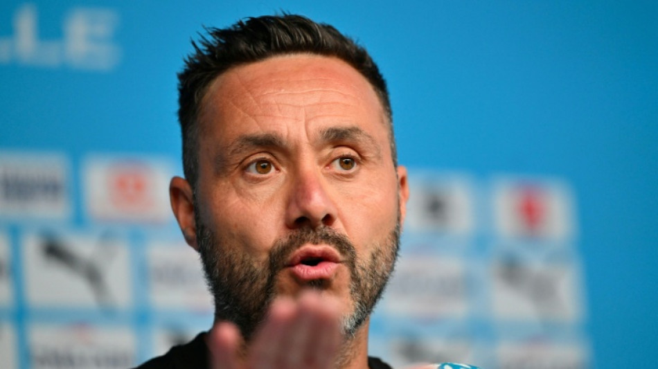 'Briga de bar', diz t&eacute;cnico do Olympique sobre discuss&atilde;o entre Rabiot e Rowe