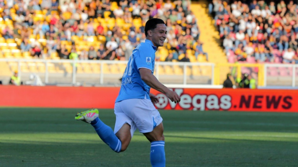 Napoli move step closer to Serie A crown after win at fiery Lecce