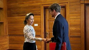 Detained Aung San Suu Kyi meets Red Cross delegate in Myanmar