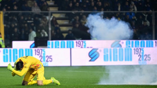 Inter eight clear after win at Cremonese marred by fans' flare flinging