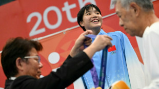 China's Yu, 13, wins third Asian Games gold but has 'some regrets'