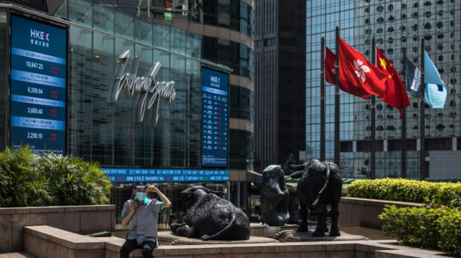 Stocks rally as Trump soothes fears over China trade, Fed