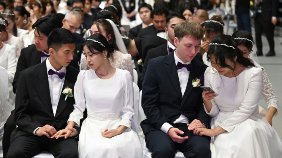 Los matrimonios masivos de "Moonies" en Corea del Sur resisten los reveses judiciales 