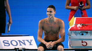 Popovici wins 100m freestyle world gold for sprint double
