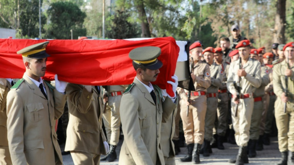 Syria buries dead after military academy drone attack