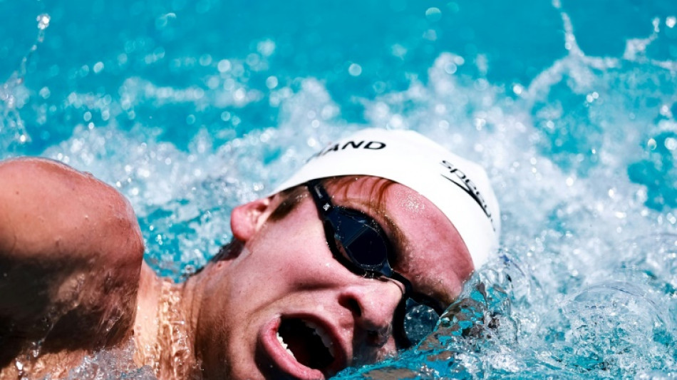 Ledecky out-duels McIntosh in sizzing 400m free