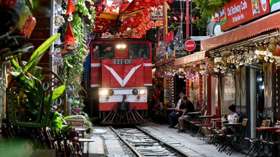 Tourists dice with danger on Hanoi's train street