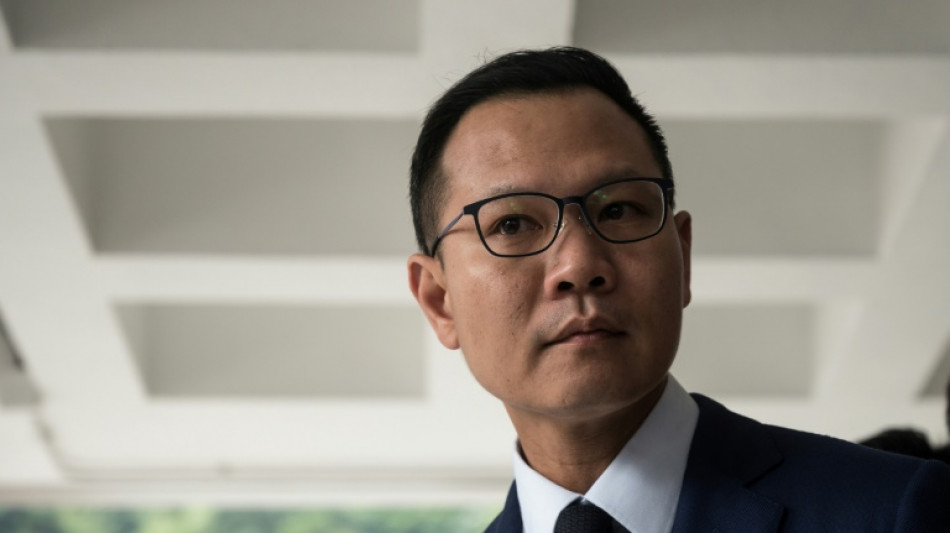 Hong Kong questions families of wanted activists