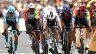 Belgian Merlier wins crash-marred Tour de France stage