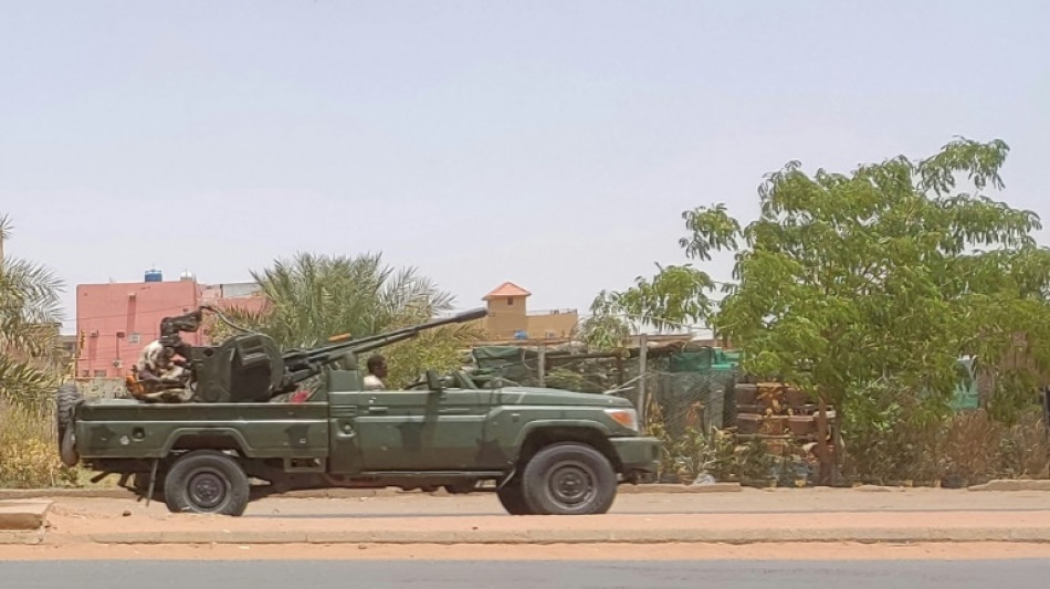 Battle for key police base kills at least 14 Sudan civilians