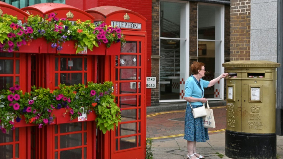 Ruling UK Conservatives suffer vote routs but avoid wipeout