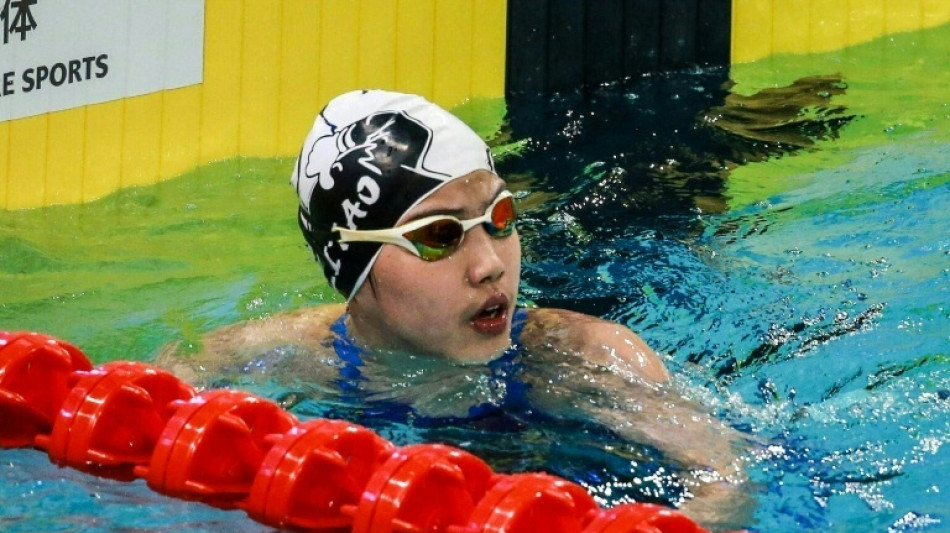 China prodigy takes on swimming world aged 12