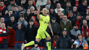 Troubled Spurs snatch late draw at Liverpool, Man Utd boost top-four bid